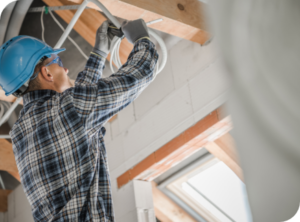 electrician installing lights